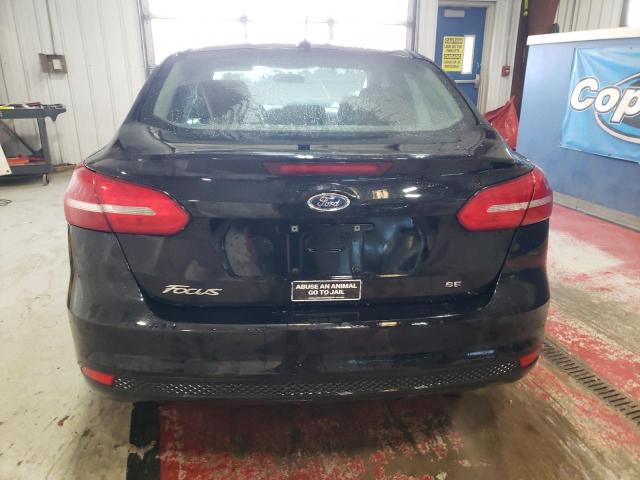 Photo 5 VIN: 1FADP3F20JL237276 - FORD FOCUS SE 