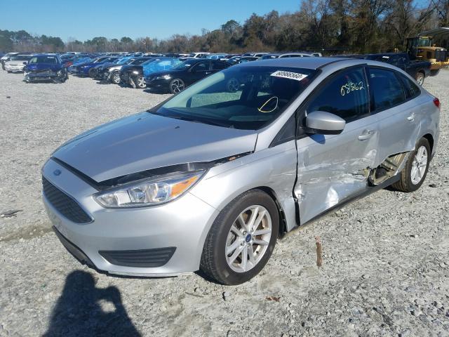 Photo 1 VIN: 1FADP3F20JL245670 - FORD FOCUS SE 