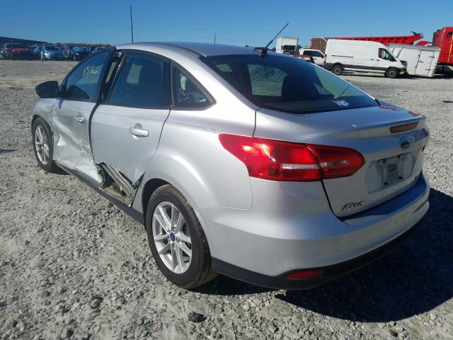 Photo 2 VIN: 1FADP3F20JL245670 - FORD FOCUS SE 