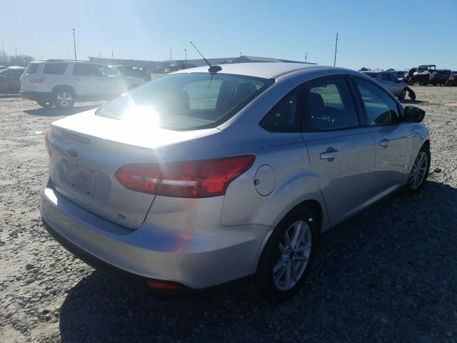 Photo 3 VIN: 1FADP3F20JL245670 - FORD FOCUS SE 