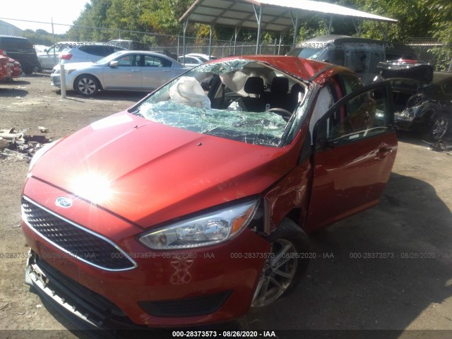 Photo 1 VIN: 1FADP3F20JL291760 - FORD FOCUS 