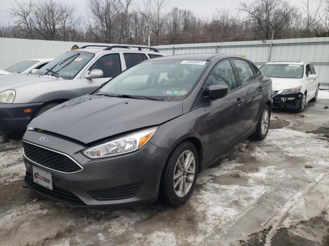 Photo 1 VIN: 1FADP3F20JL306385 - FORD FOCUS SE 