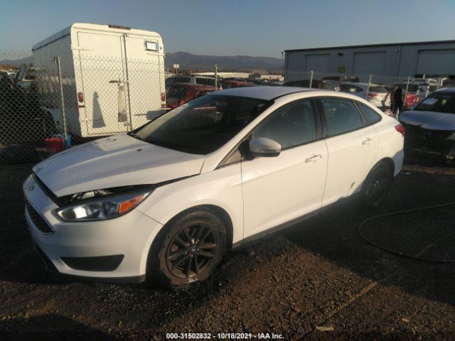 Photo 1 VIN: 1FADP3F20JL318018 - FORD FOCUS 