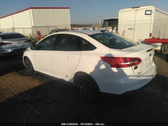 Photo 2 VIN: 1FADP3F20JL318018 - FORD FOCUS 