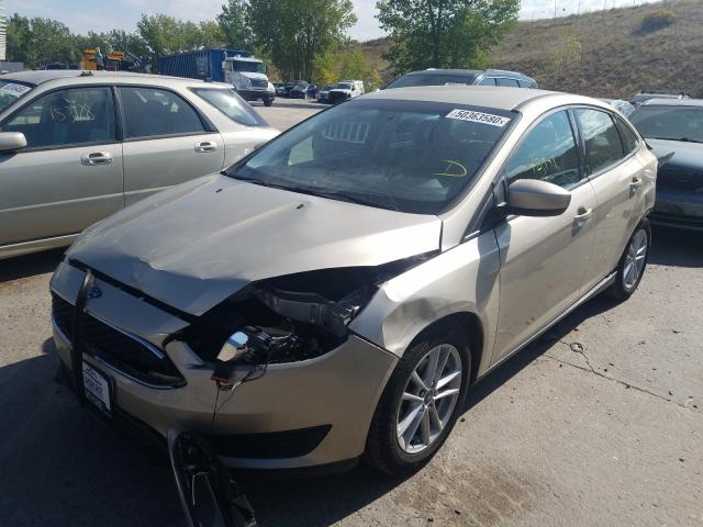 Photo 1 VIN: 1FADP3F20JL319329 - FORD FOCUS SE 