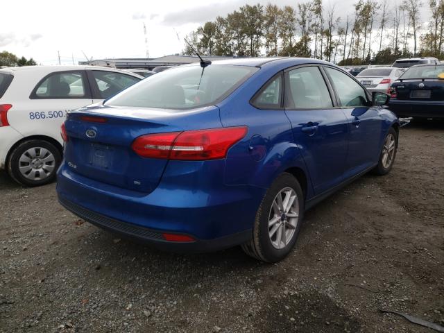 Photo 3 VIN: 1FADP3F20JL327950 - FORD FOCUS SE 