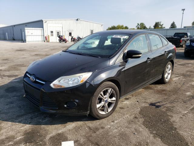 Photo 1 VIN: 1FADP3F21DL122058 - FORD FOCUS SE 