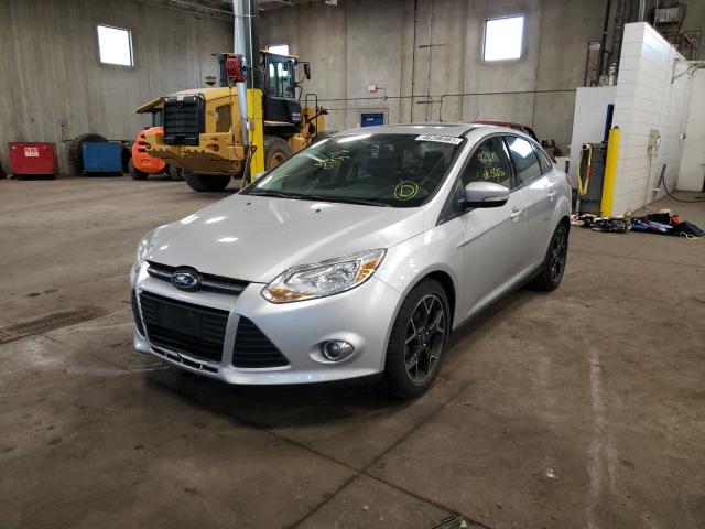 Photo 1 VIN: 1FADP3F21DL131861 - FORD FOCUS SE 