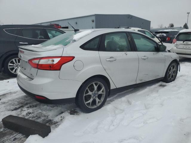 Photo 2 VIN: 1FADP3F21DL132623 - FORD FOCUS 