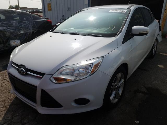 Photo 1 VIN: 1FADP3F21DL150569 - FORD FOCUS SE 