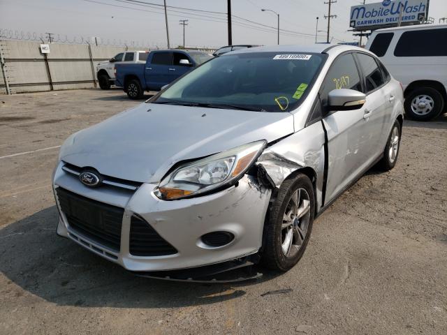 Photo 1 VIN: 1FADP3F21DL170661 - FORD FOCUS SE 