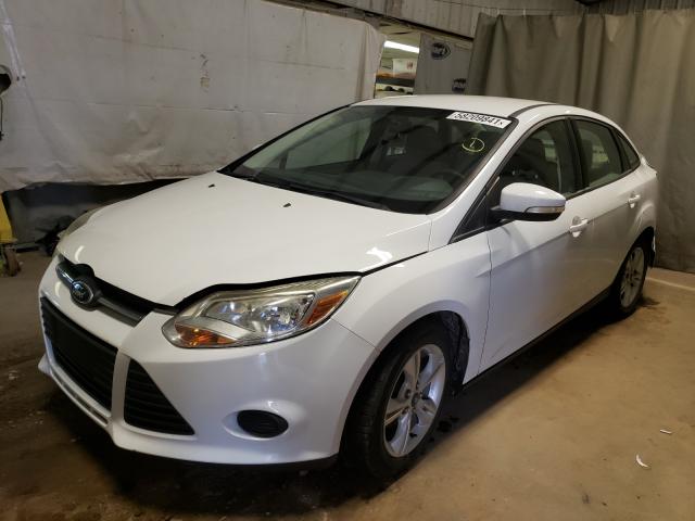 Photo 1 VIN: 1FADP3F21DL174628 - FORD FOCUS SE 