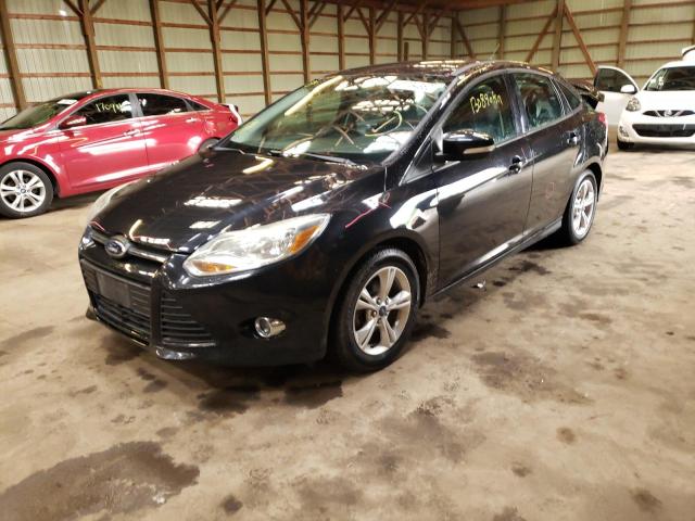 Photo 1 VIN: 1FADP3F21DL273899 - FORD FOCUS SE 