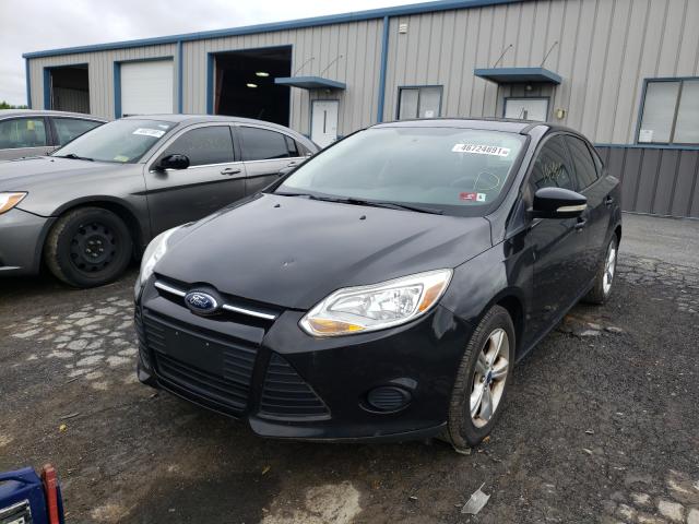 Photo 1 VIN: 1FADP3F21DL275586 - FORD FOCUS SE 