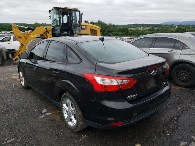 Photo 2 VIN: 1FADP3F21DL275586 - FORD FOCUS SE 