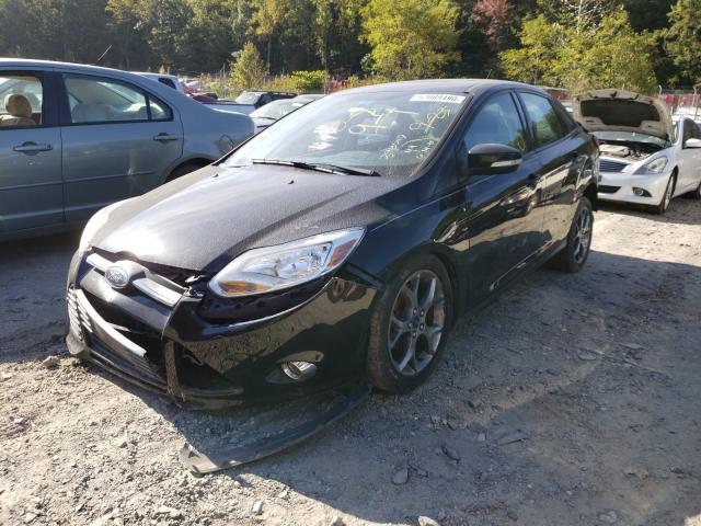 Photo 1 VIN: 1FADP3F21DL302320 - FORD FOCUS SE 