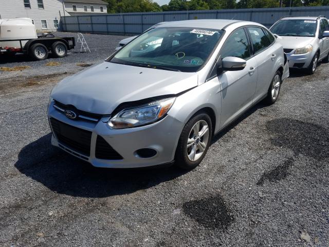 Photo 1 VIN: 1FADP3F21DL305203 - FORD FOCUS SE 