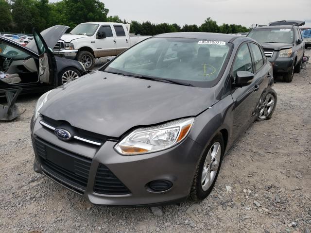 Photo 1 VIN: 1FADP3F21DL305573 - FORD FOCUS SE 