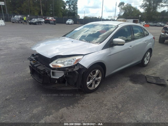 Photo 1 VIN: 1FADP3F21DL317576 - FORD FOCUS 