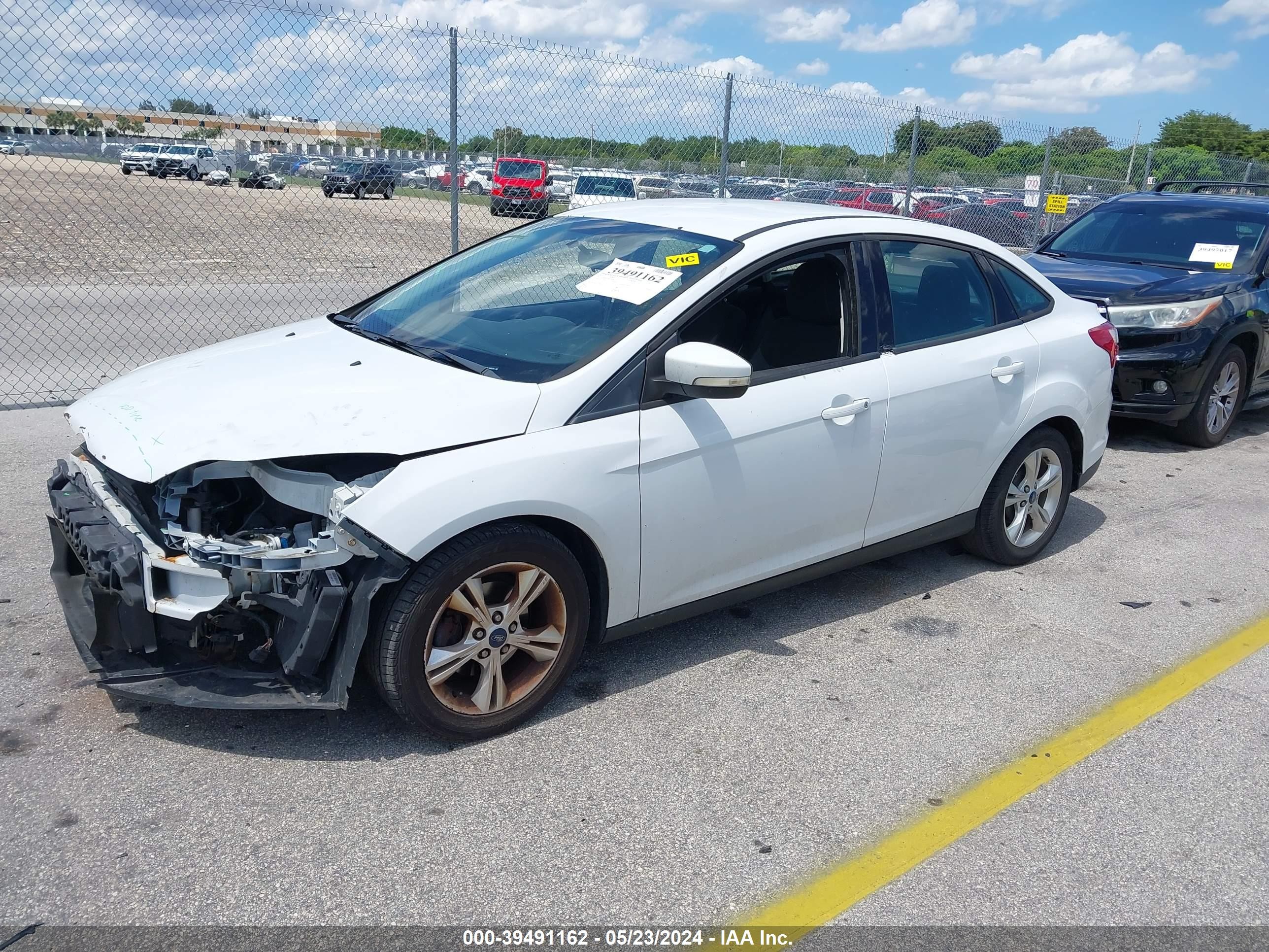 Photo 1 VIN: 1FADP3F21DL348620 - FORD FOCUS 