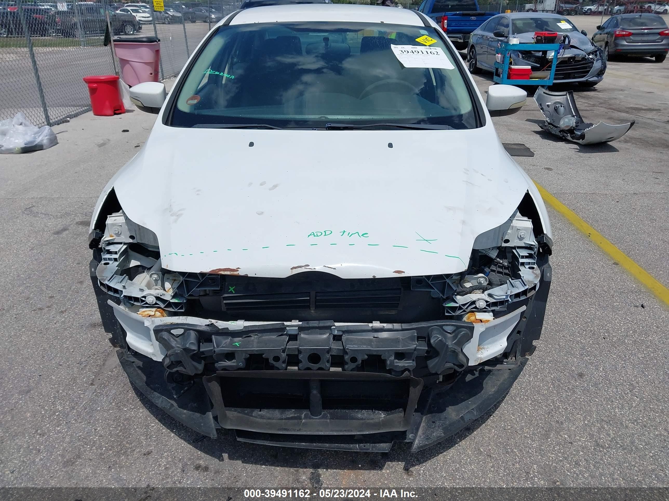 Photo 12 VIN: 1FADP3F21DL348620 - FORD FOCUS 