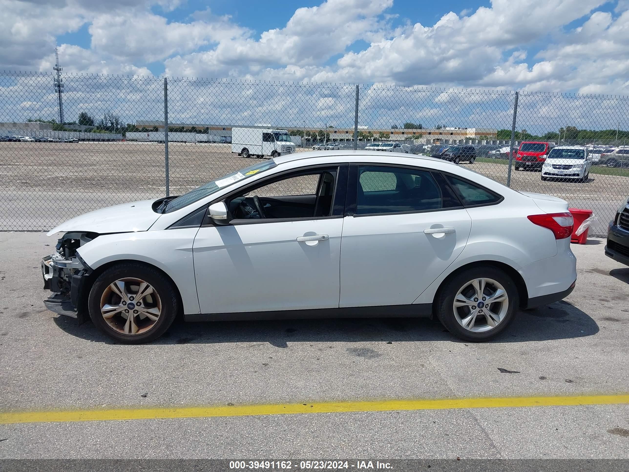 Photo 14 VIN: 1FADP3F21DL348620 - FORD FOCUS 