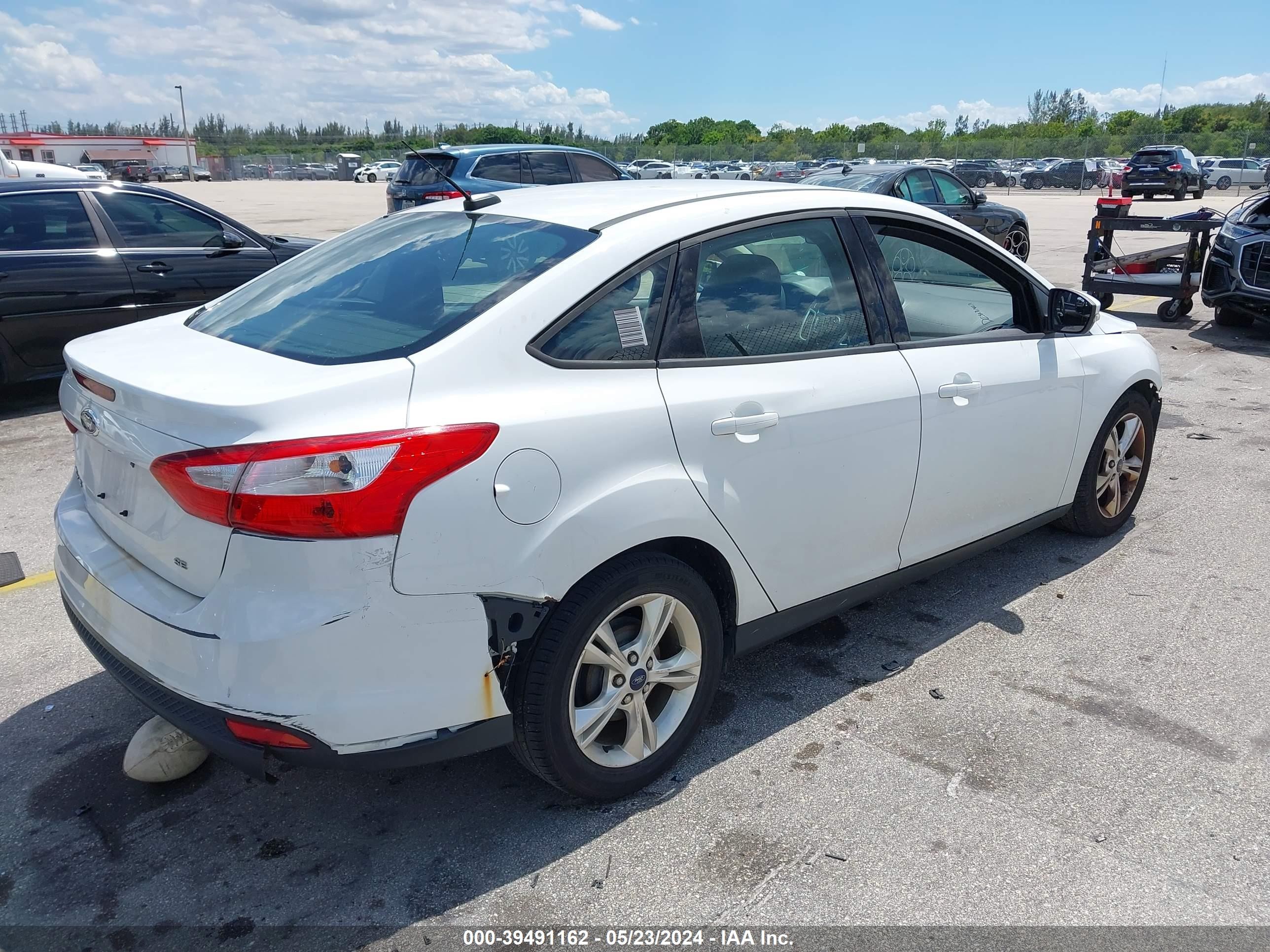 Photo 3 VIN: 1FADP3F21DL348620 - FORD FOCUS 