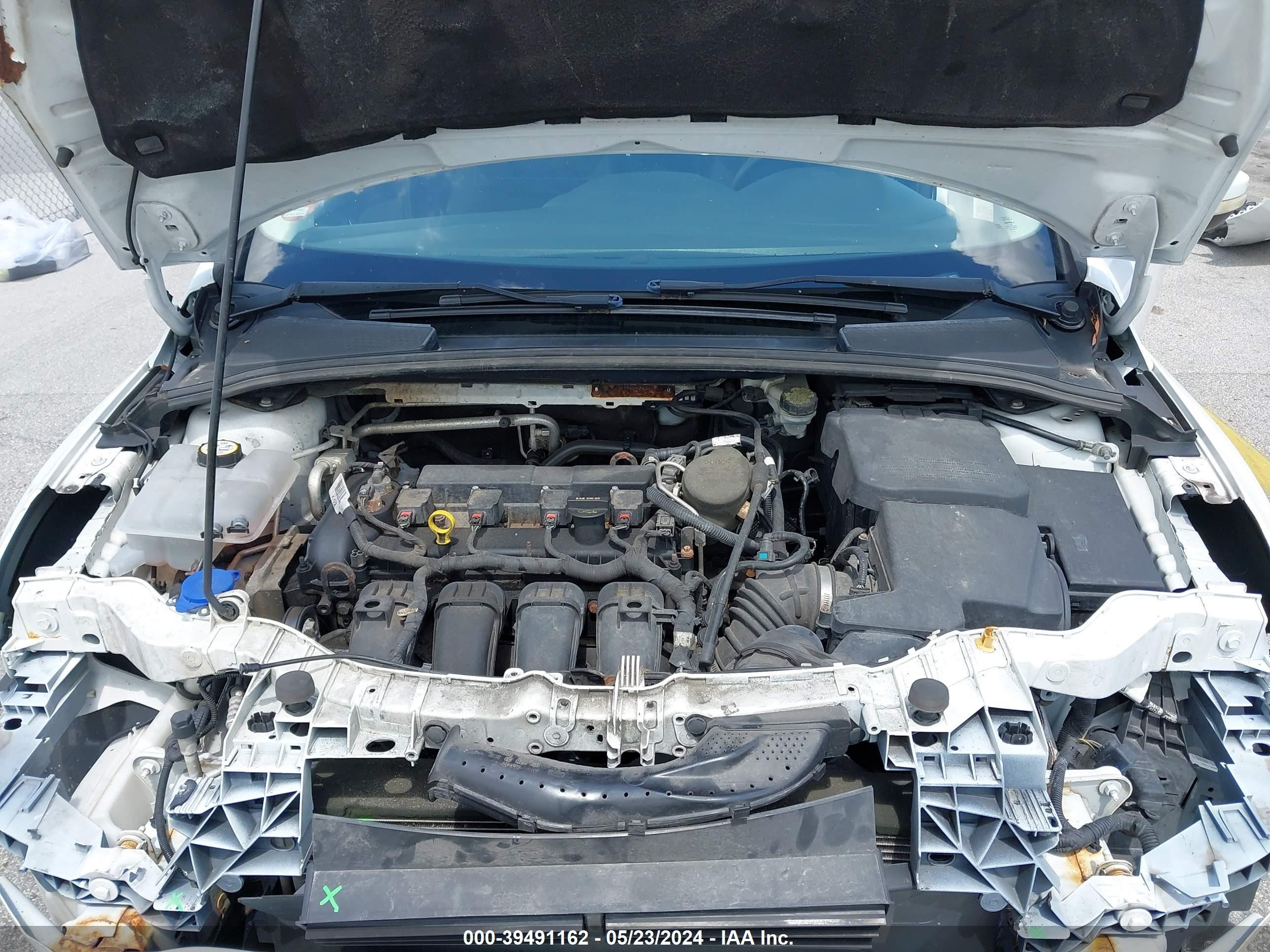 Photo 9 VIN: 1FADP3F21DL348620 - FORD FOCUS 