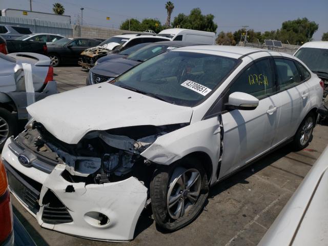 Photo 1 VIN: 1FADP3F21EL219147 - FORD FOCUS SE 