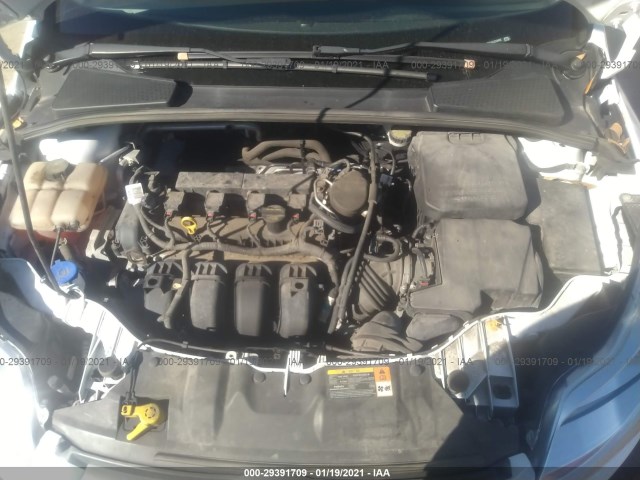 Photo 9 VIN: 1FADP3F21EL243402 - FORD FOCUS 