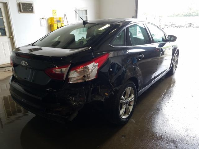 Photo 3 VIN: 1FADP3F21EL272592 - FORD FOCUS SE 