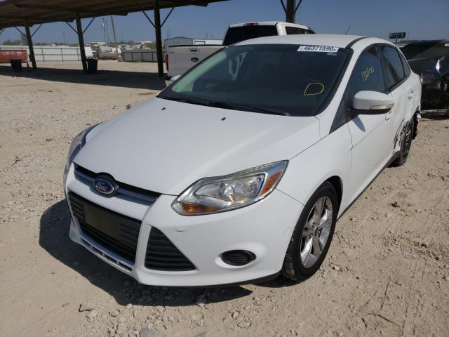 Photo 1 VIN: 1FADP3F21EL319023 - FORD FOCUS SE 