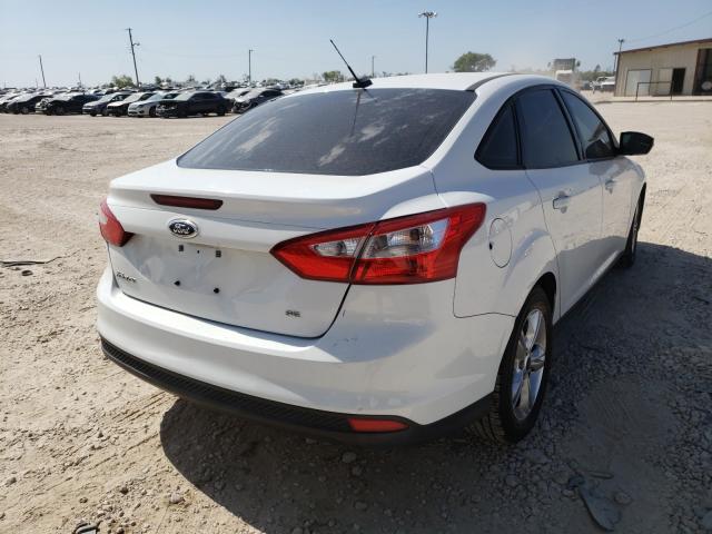 Photo 3 VIN: 1FADP3F21EL319023 - FORD FOCUS SE 