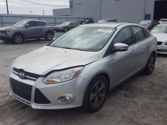 Photo 1 VIN: 1FADP3F21EL349283 - FORD FOCUS SE 