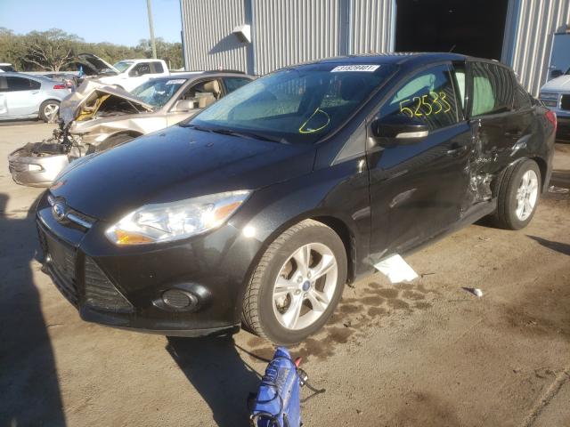 Photo 1 VIN: 1FADP3F21EL417064 - FORD FOCUS SE 