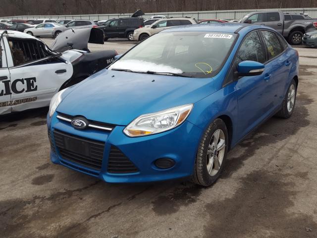 Photo 1 VIN: 1FADP3F21EL459055 - FORD FOCUS SE 