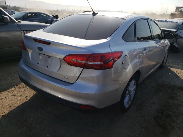 Photo 3 VIN: 1FADP3F21FL233924 - FORD FOCUS SE 