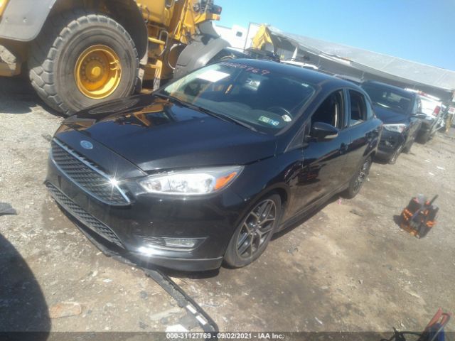 Photo 1 VIN: 1FADP3F21FL273825 - FORD FOCUS 