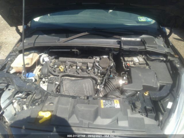 Photo 9 VIN: 1FADP3F21FL273825 - FORD FOCUS 