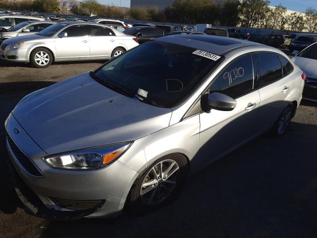 Photo 1 VIN: 1FADP3F21FL316916 - FORD FOCUS SE 