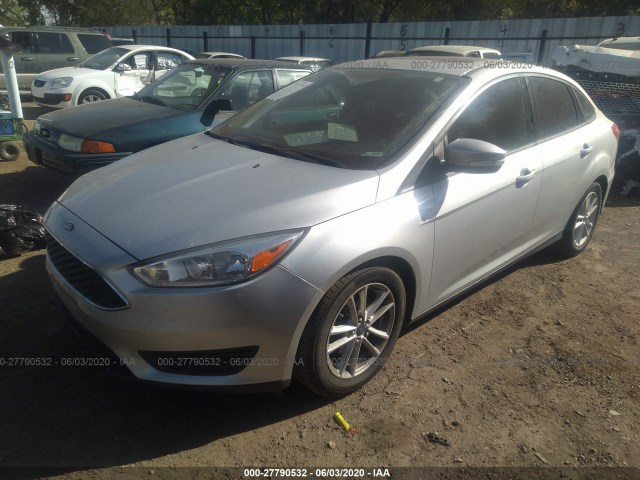 Photo 1 VIN: 1FADP3F21GL205249 - FORD FOCUS 