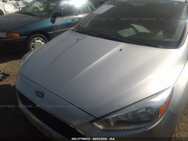 Photo 5 VIN: 1FADP3F21GL205249 - FORD FOCUS 