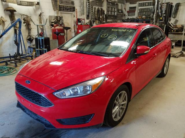 Photo 1 VIN: 1FADP3F21GL205686 - FORD FOCUS SE 