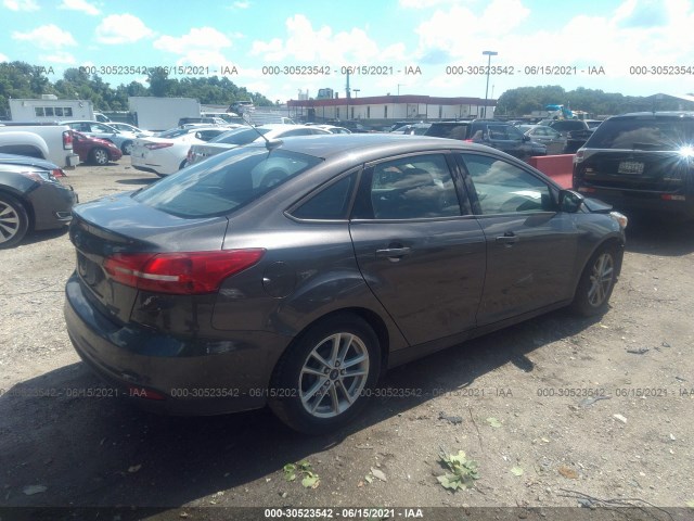 Photo 3 VIN: 1FADP3F21GL211097 - FORD FOCUS 