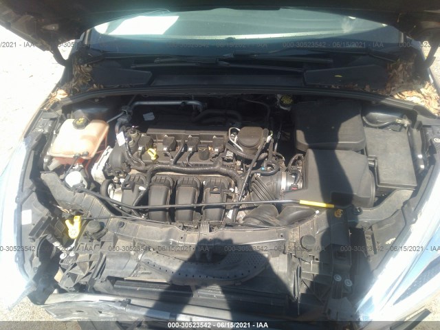 Photo 9 VIN: 1FADP3F21GL211097 - FORD FOCUS 