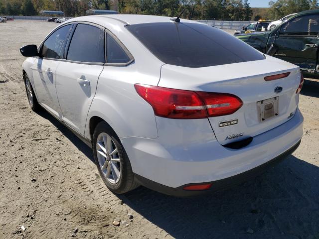 Photo 2 VIN: 1FADP3F21GL231205 - FORD FOCUS SE 