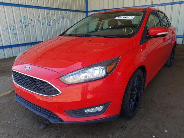 Photo 1 VIN: 1FADP3F21GL235500 - FORD FOCUS SE 