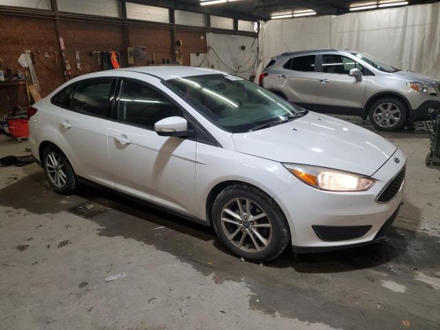 Photo 3 VIN: 1FADP3F21GL237425 - FORD FOCUS SE 