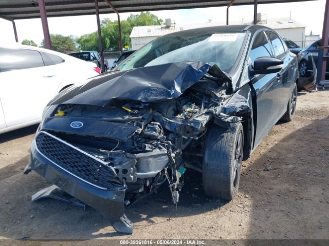 Photo 5 VIN: 1FADP3F21GL246531 - FORD FOCUS 