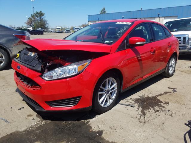 Photo 1 VIN: 1FADP3F21GL257402 - FORD FOCUS SE 